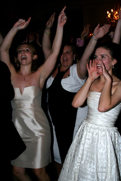 Bride cheering on the Groom